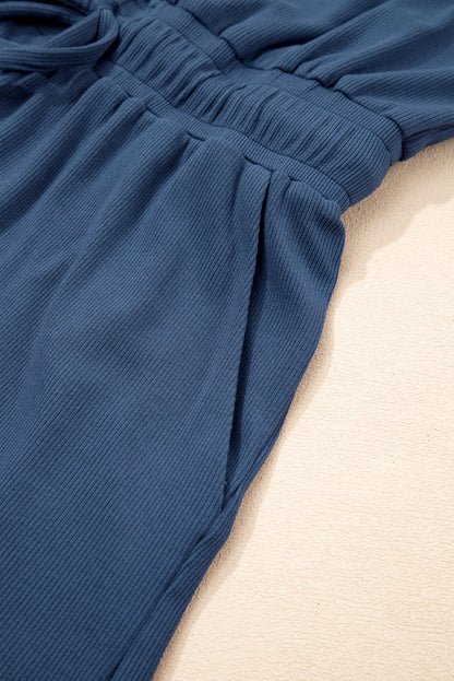 Ashleigh Blue Knit Open Back Cap Sleeve Drawstring Romper