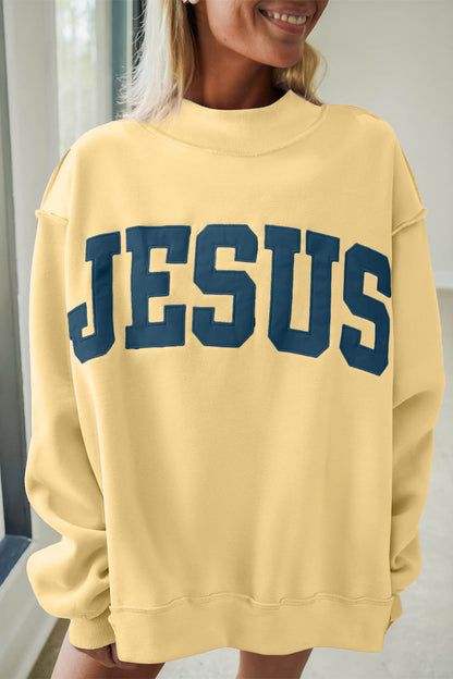 Banana Cream JESUS Letter Patch Graphic Exposed Seam Mock Neck Baggy Sweatshirt